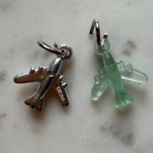 Set of two rare Hong Kong cracker Jack acrylic Silver and Green Airplane Charms